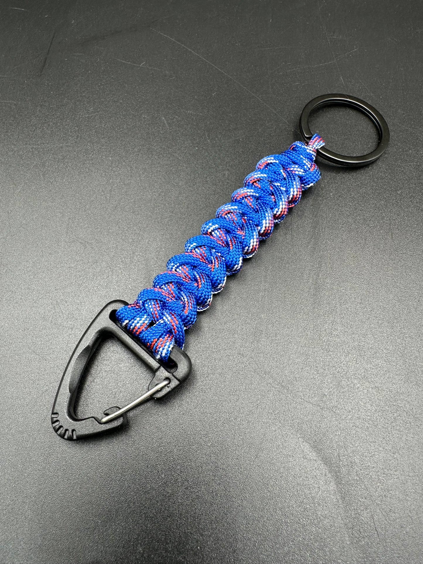 Tactical EDC Paracord keyring with triangle clip and key ring in Patriot Blue coloured shark jaw weave