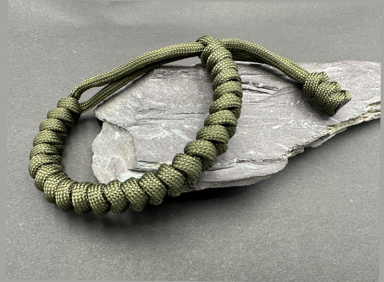 Paracord survival bracelets army Olive green colour, item is lightweight comfortable and handmade in a snake knott design U.K.