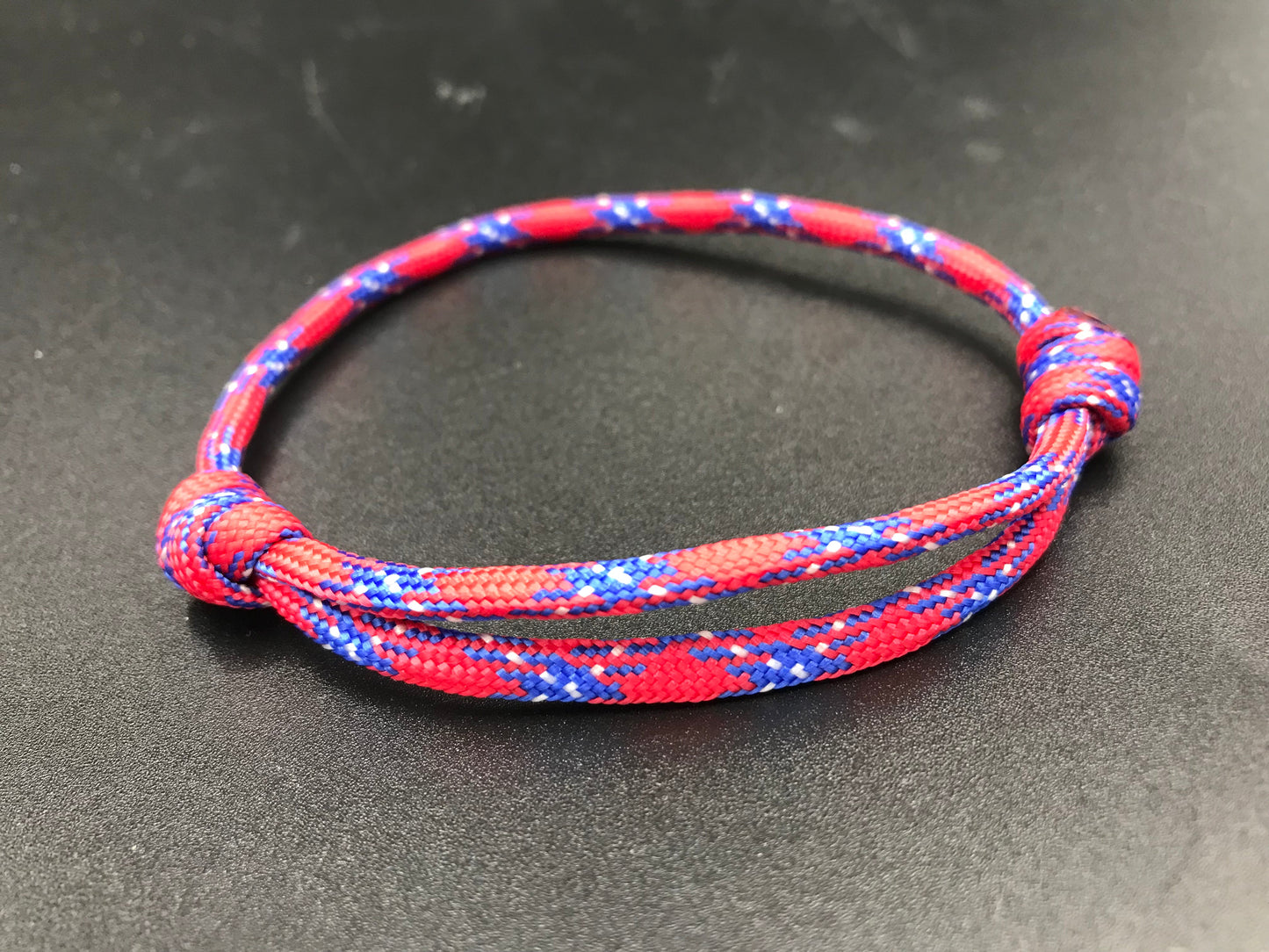 Paracord friendship bracelet in Texas red ( red, light blue white) like the Texas flag lightweight and fully adjustable