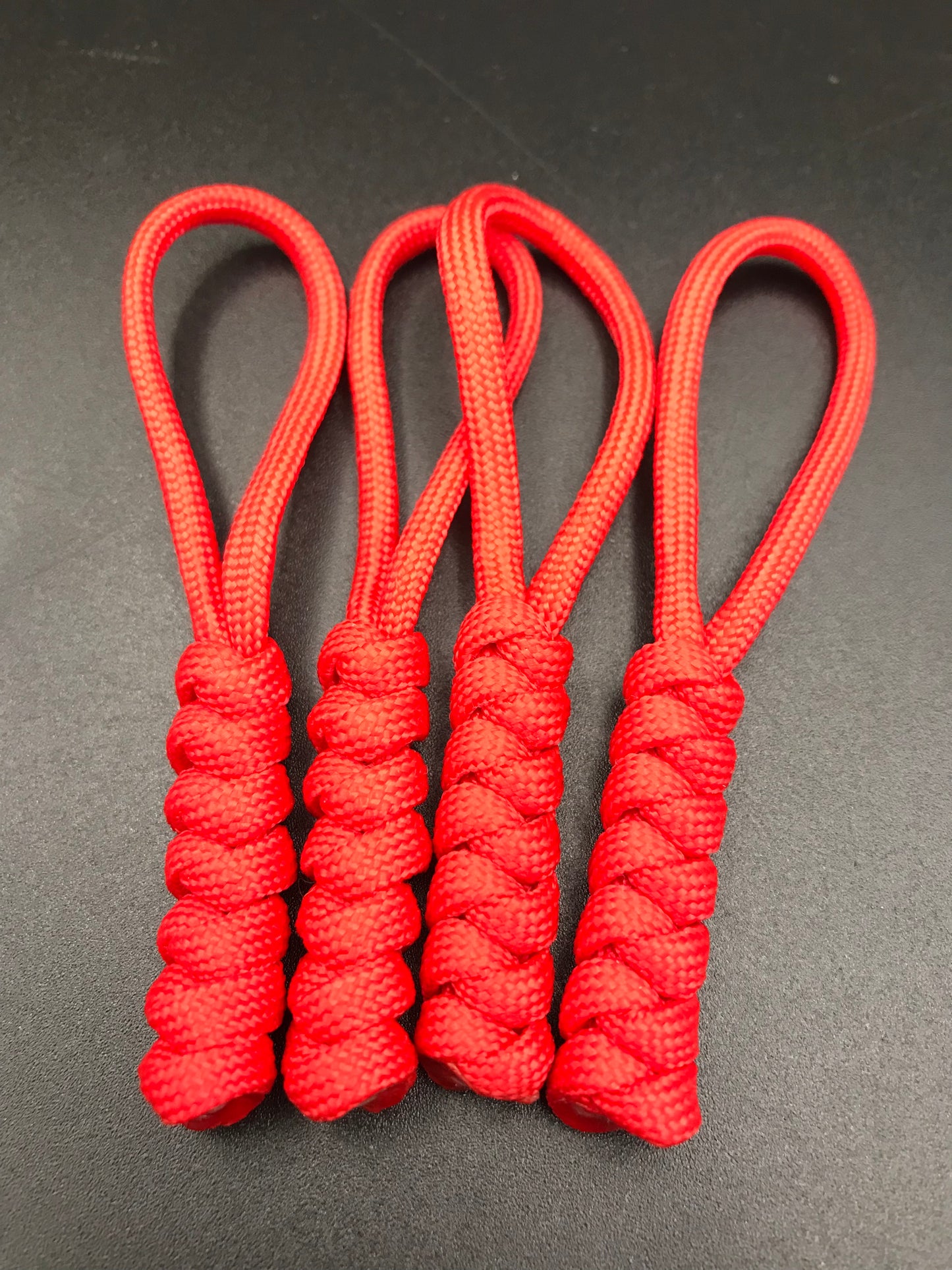 Paracord zip pulls in a red (4 pack) light weight and strong, handmade in U.K