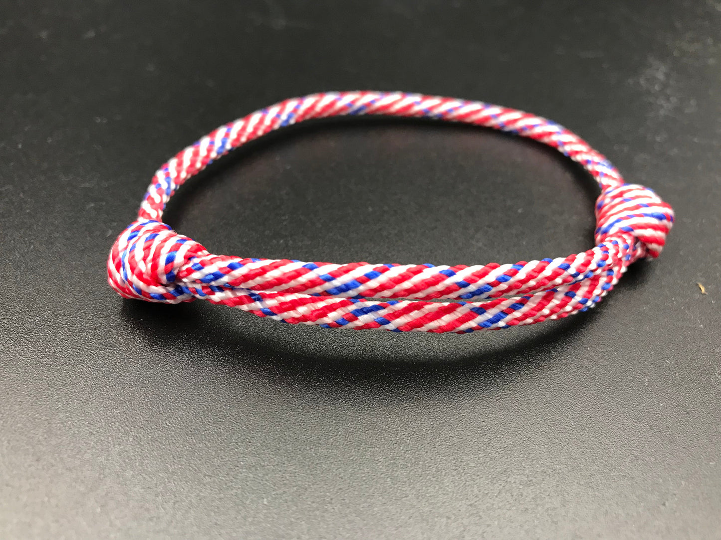 Paracord friendship bracelet In USA theme ( blue red & white ) light weight and adjustable