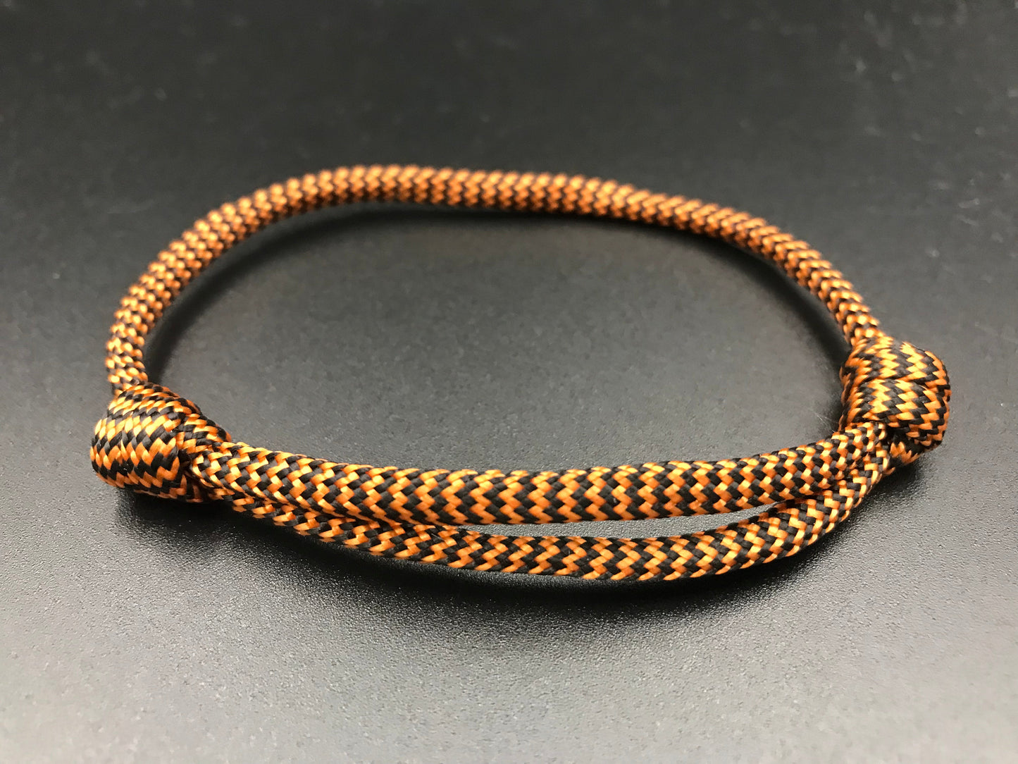 Paracord friendship bracelet in bronze with zing zag pattern light weight and fully adjustable