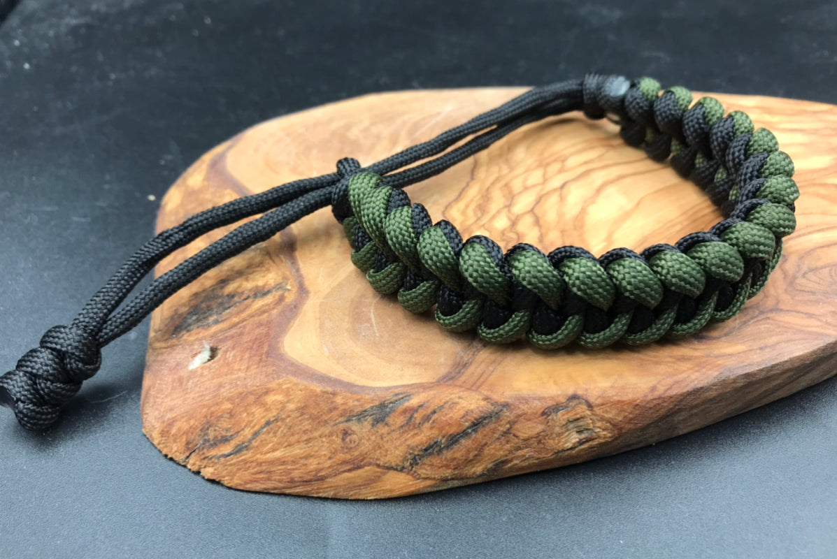 Paracord survival bracelet hand made lightweight and in black and army Olive green coloured Paracord U.K.