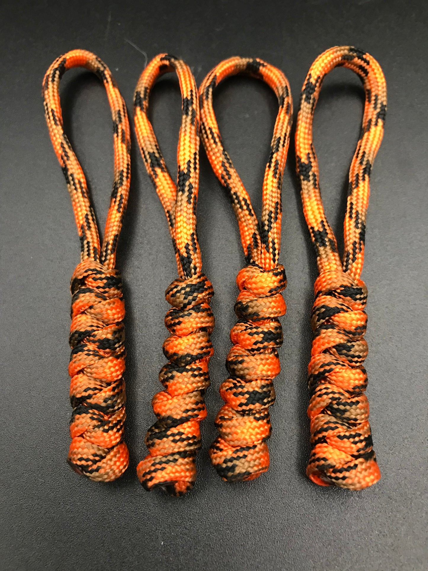 Paracord zip pulls in pumpkin orange (orange and black mix ) (4 pack) hand made in U.K.