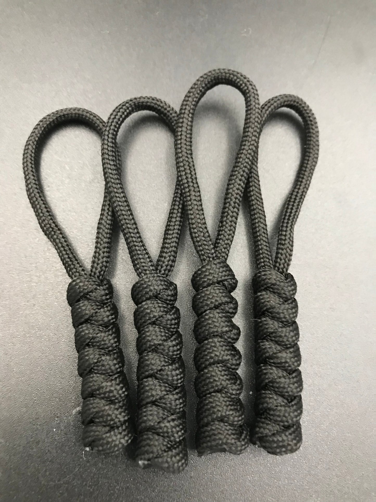 Paracord zip pulls in black (4 pack) hand made in U.K.