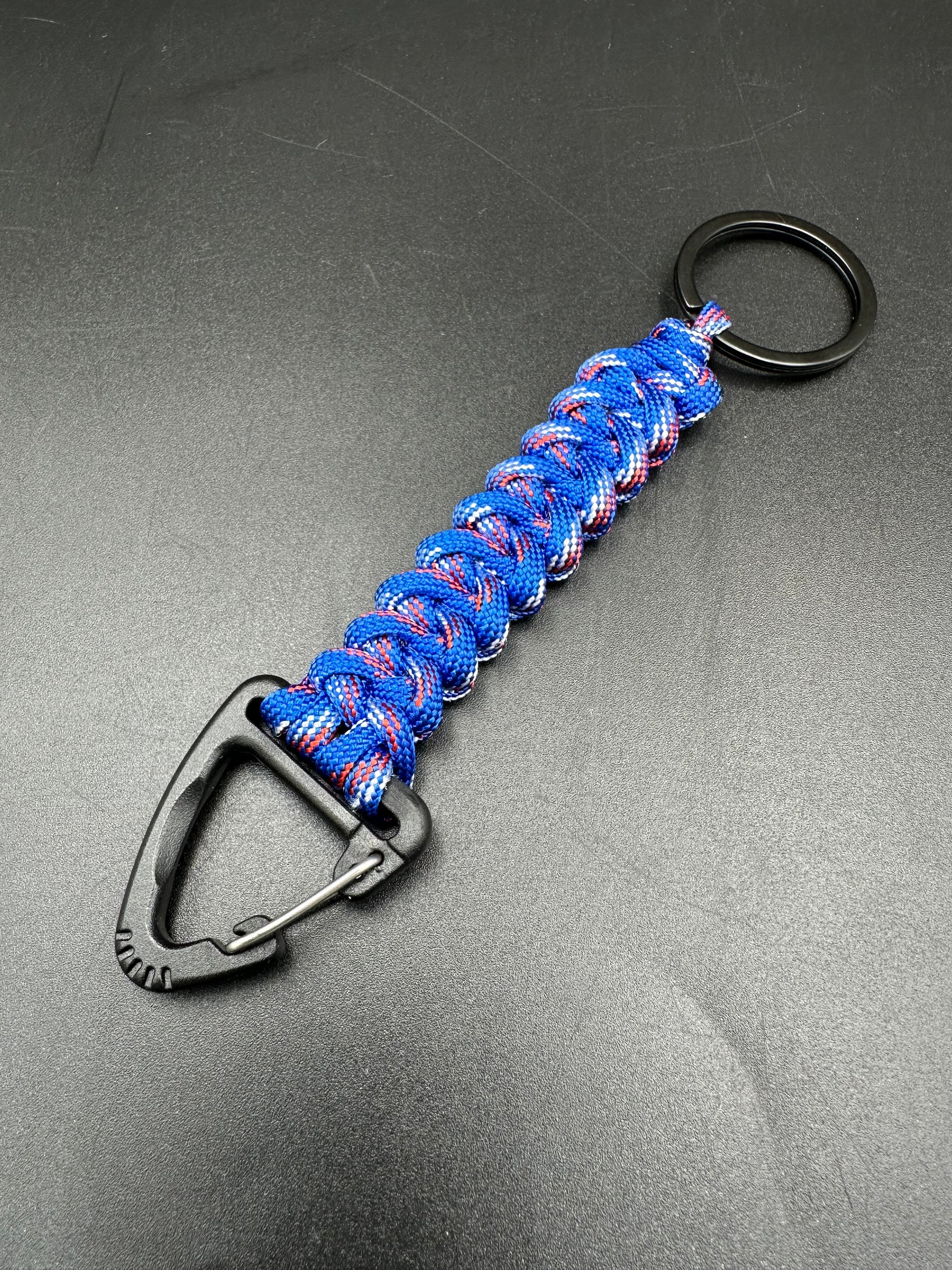 Tactical EDC Paracord keyring with triangle clip and key ring in Patriot Blue coloured shark jaw weave 