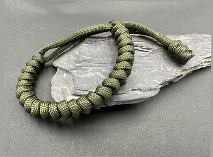 Paracord survival bracelets army Olive green colour, item is lightweight comfortable and handmade in a snake knott design U.K.