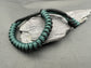 Paracord survival bracelets in a black and Emerald green colour, the item is lightweight comfortable and handmade in a snake knott tactical design U.K.