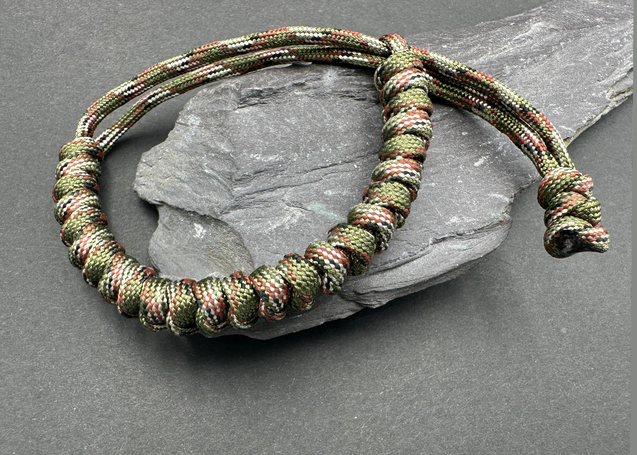 Paracord survival bracelets in Army Green camouflage lightweight compfortable and handmade in a snake knott design U.K.