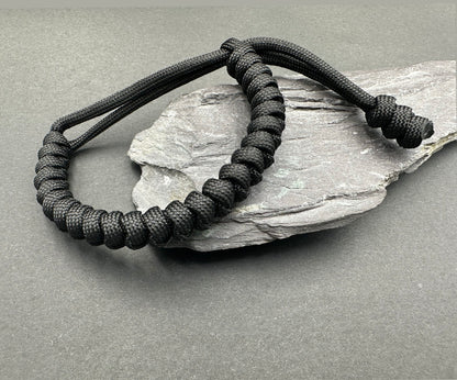 Paracord survival bracelets in Bold Black lightweight compfortable and handmade in a snake knott design U.K.