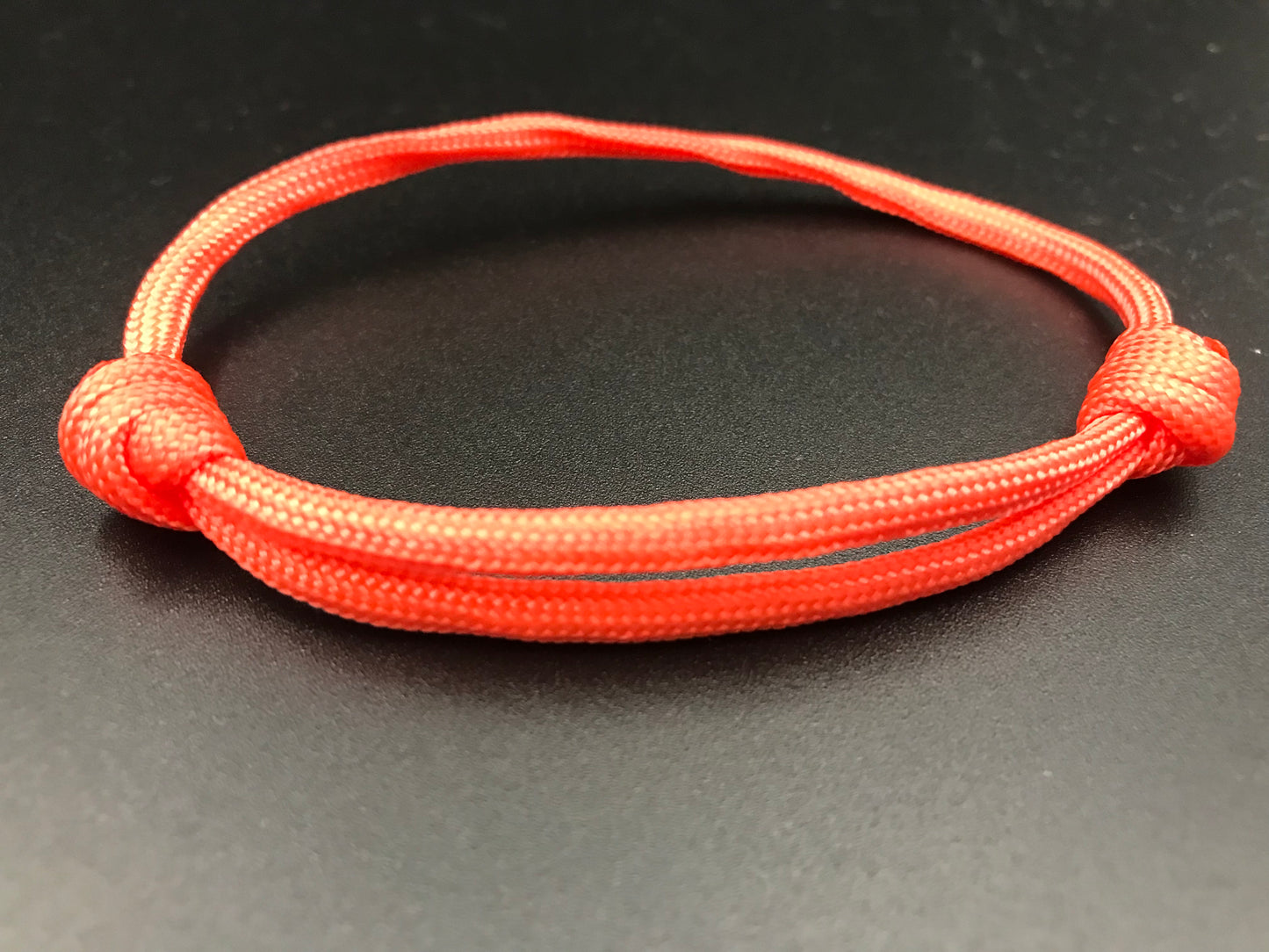 Paracord friendship bracelet In Orange light weight and adjustable