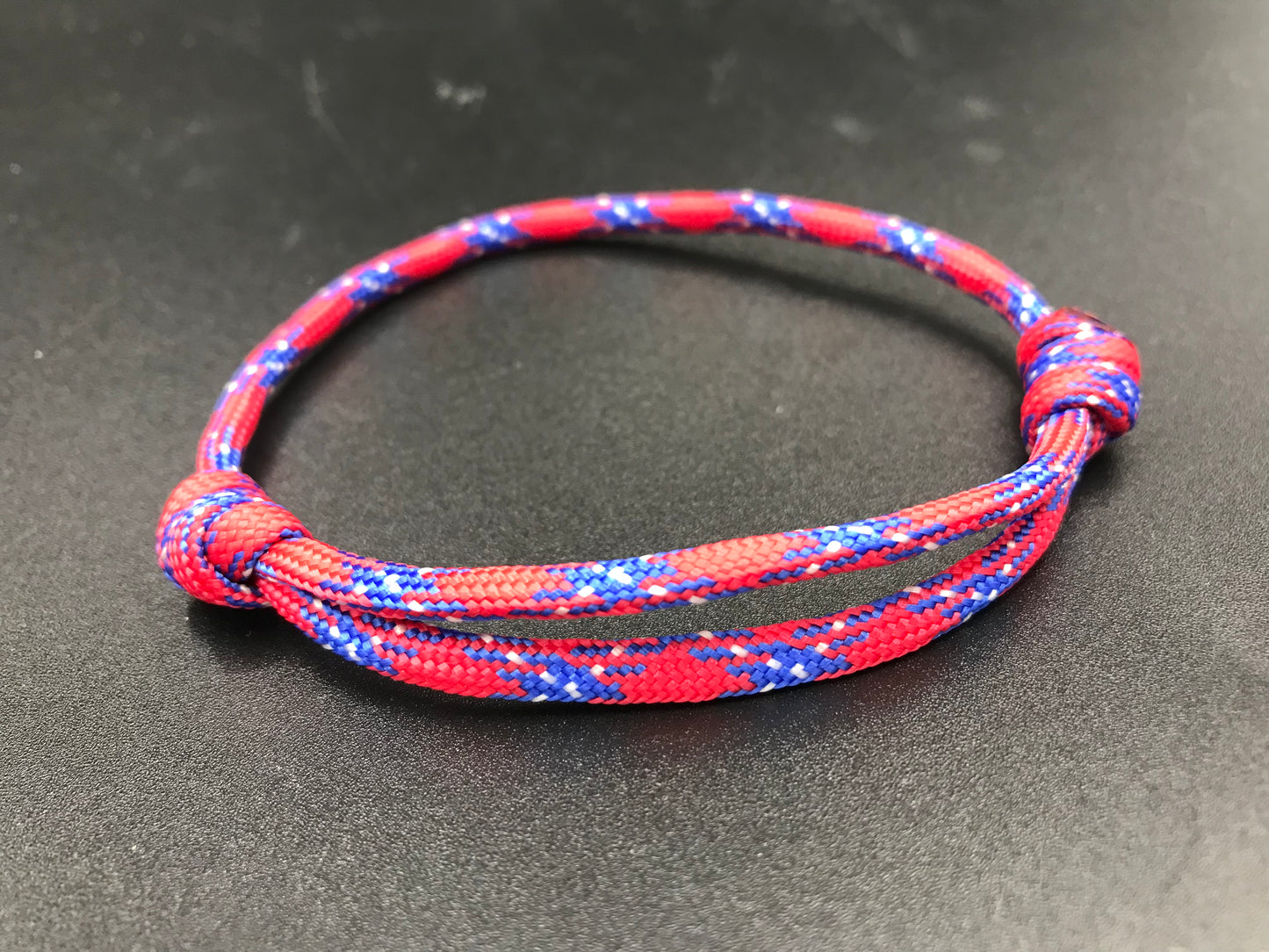 Paracord friendship bracelet in Texas red ( red, light blue white) like the Texas flag lightweight and fully adjustable 