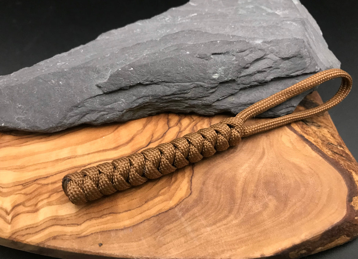 Paracord EDC multi tool - torch and keys lanyard 
Hand made Paracord lanyard in Kaki brown coloured Paracord and woven in the serpent snake knot design