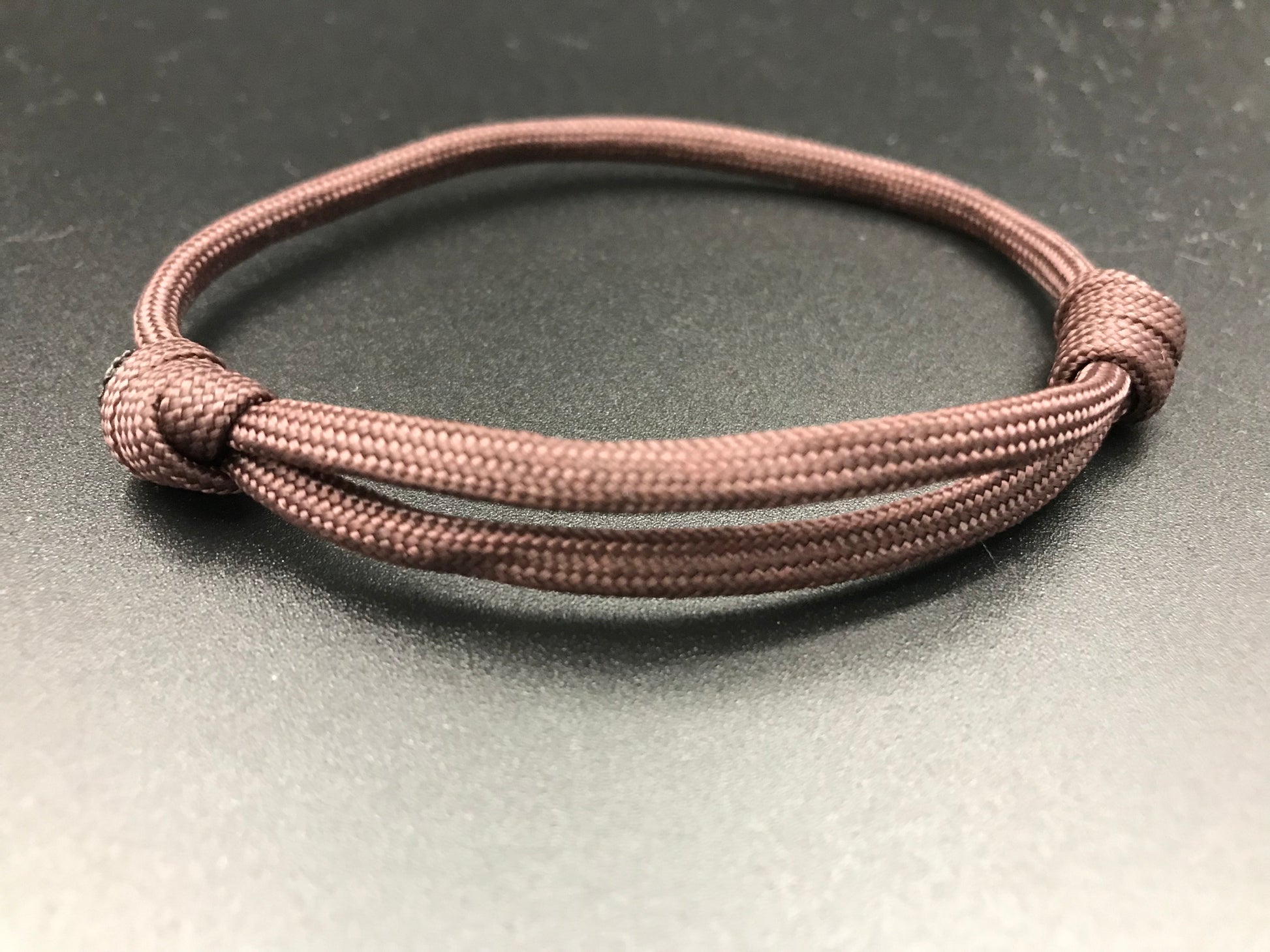 Paracord friendship bracelet In cholesterol brownie ( chocolate brown coloured) light weight and adjustable
