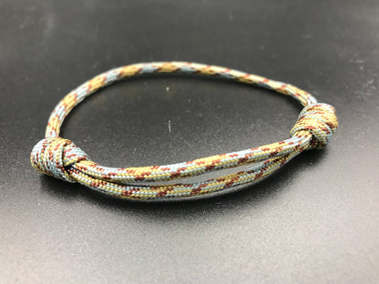 Paracord friendship bracelet In sand snake colour ( light grey light brown dark brown spots ) light weight and adjustable