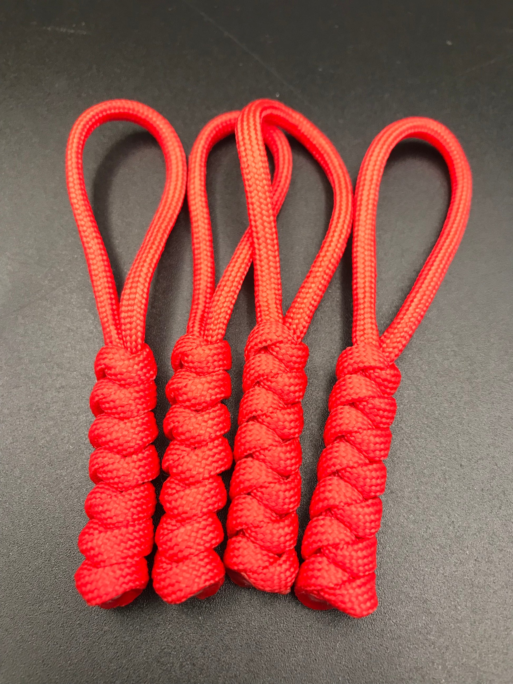Paracord zip pulls in a red (4 pack) light weight and strong, handmade in U.K