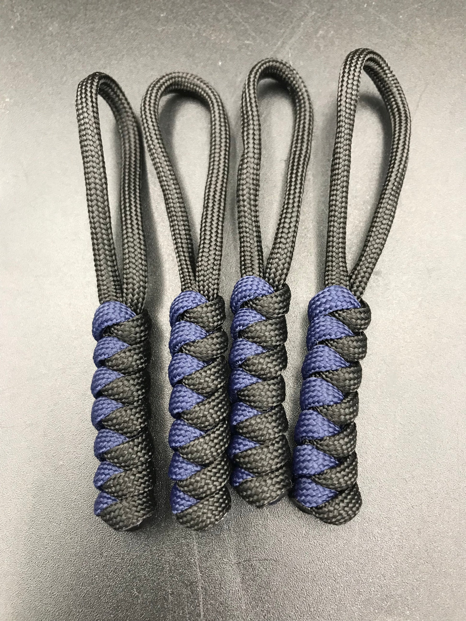 Paracord zip pulls in black and navy blue (4 pack) light weight, strong and hand crafted in U.K