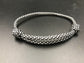 Paracord friendship bracelet in silver with black diamond pattern lightweight and fully adjustable 