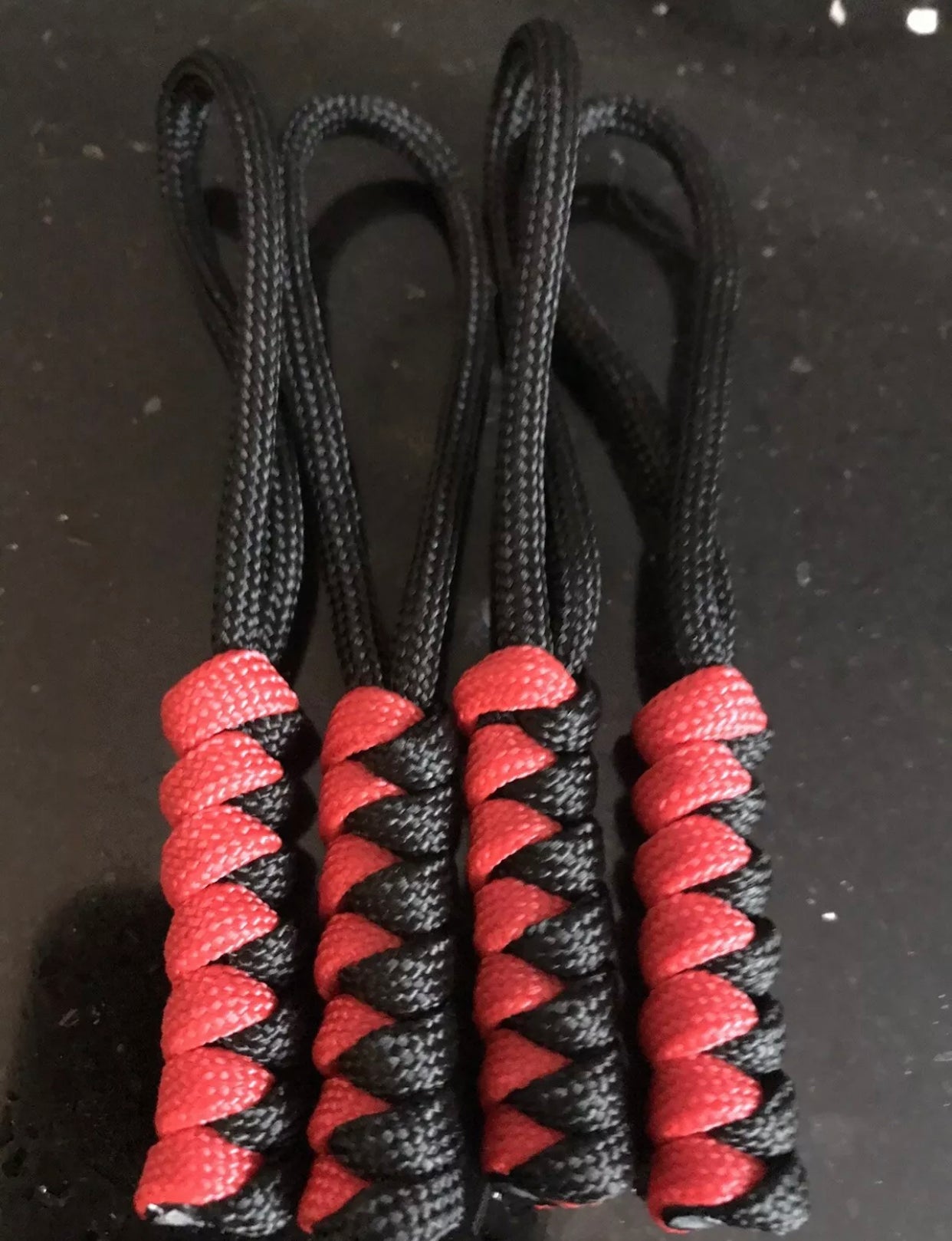 Paracord zip pulls in black and red (4 pack) light weight and strong, handmade in U.K