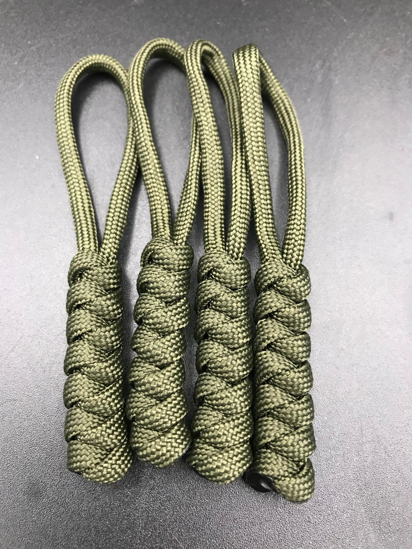 Paracord zip pulls in army Olive green (4 pack) light weight, strong and hand crafted in U.K
