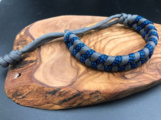 Handmade Paracord bracelet in grey and blue diamond coloured fishtail weave  