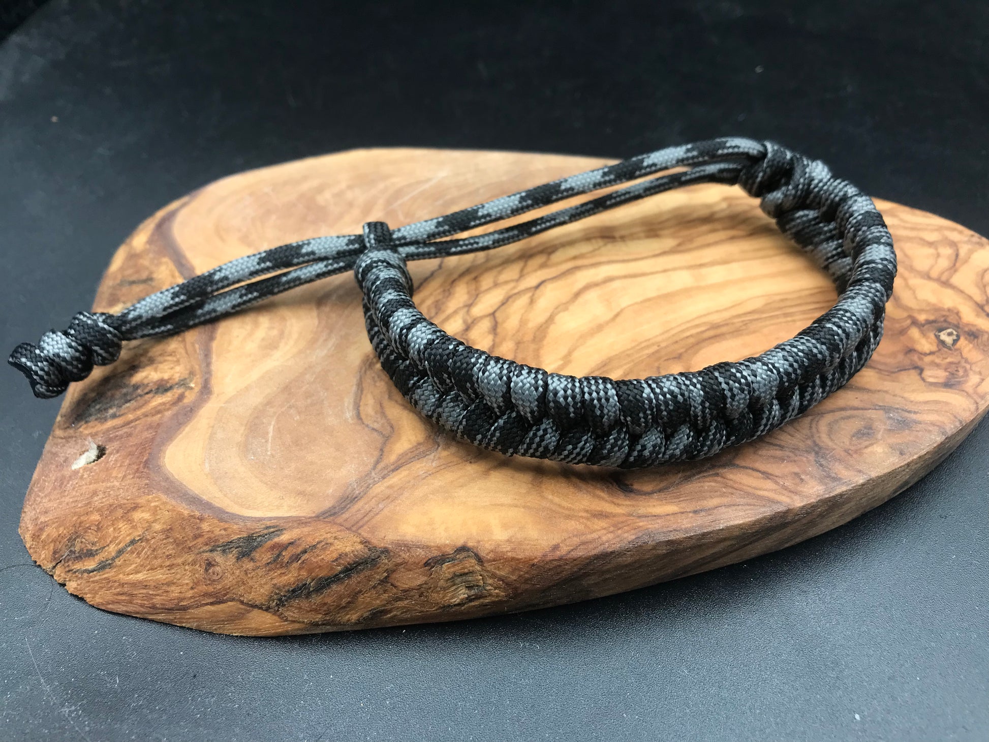 Handmade Paracord Fishtail weave bracelet in graphite grey and black colour