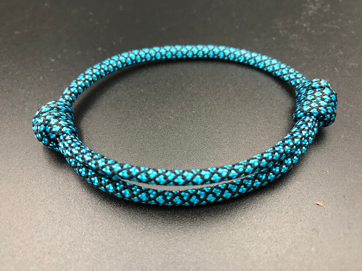 Paracord friendship bracelet In teal blue diamond ( black diamond pattern ) light weight and adjustable