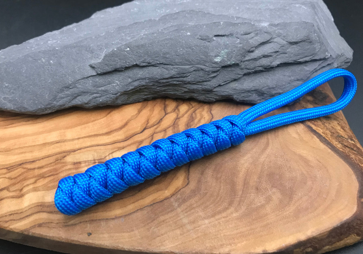 Paracord EDC multi tool - torch and keys lanyard 
This lanyard is made from Paracord in a Sky blue themed colour snake knot design