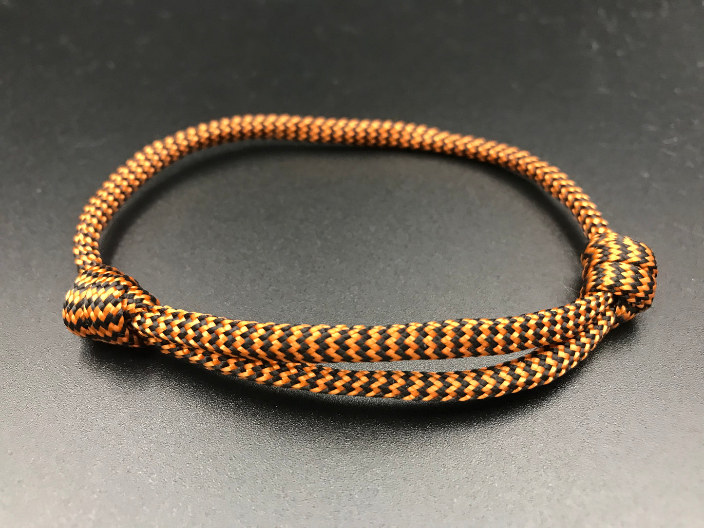 Paracord friendship bracelet in bronze with zing zag pattern light weight and fully adjustable 