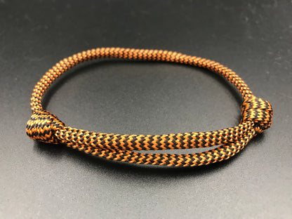Paracord friendship bracelet in bronze with zing zag pattern light weight and fully adjustable 
