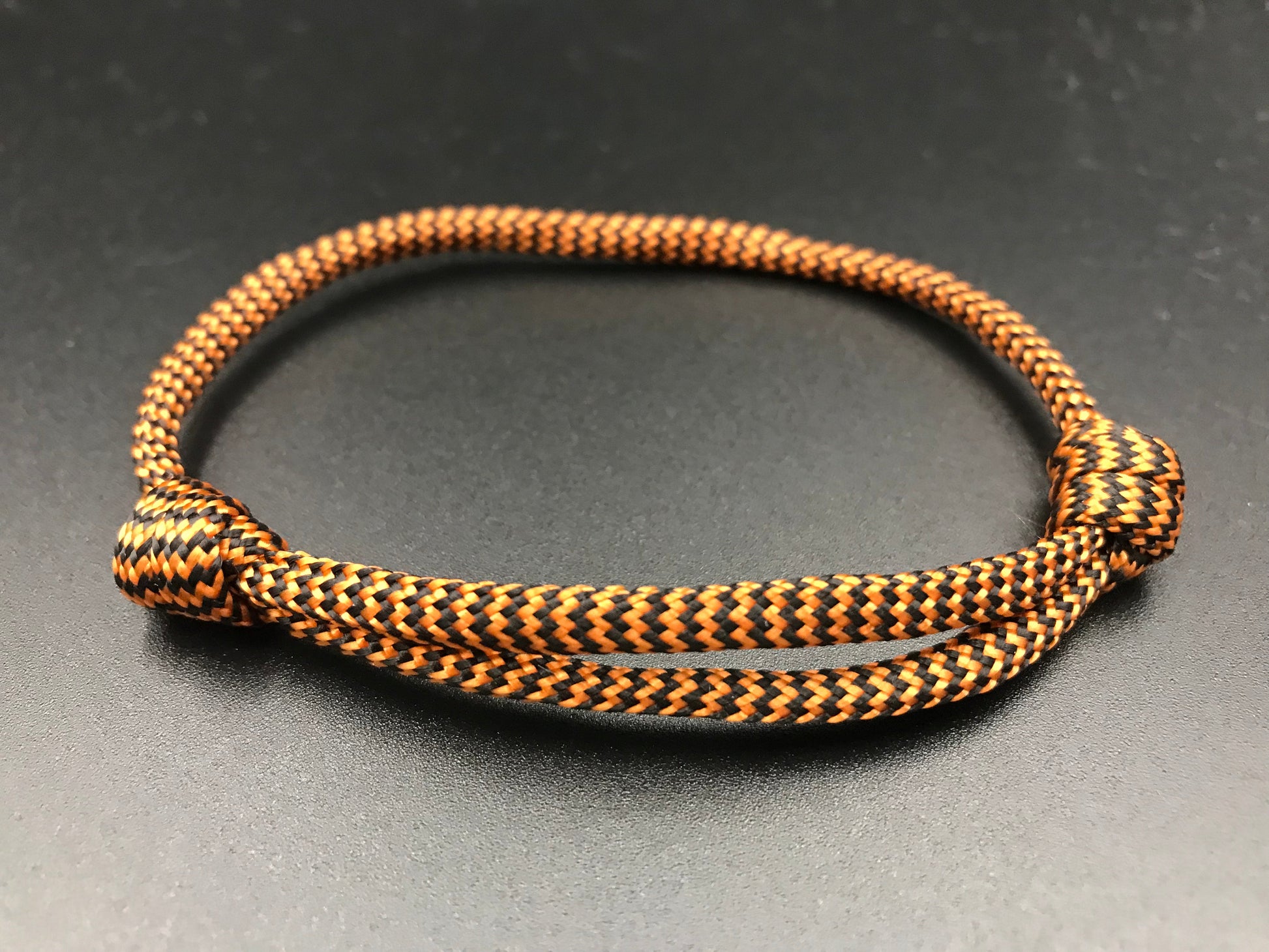 Paracord friendship bracelet in bronze with zing zag pattern light weight and fully adjustable 