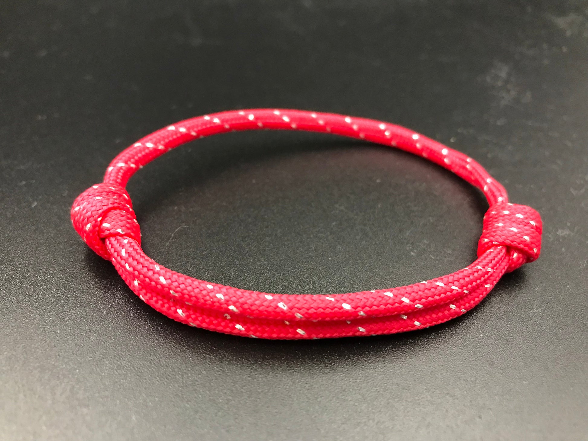 Paracord friendship bracelet In red and silver fleck fully adjustable