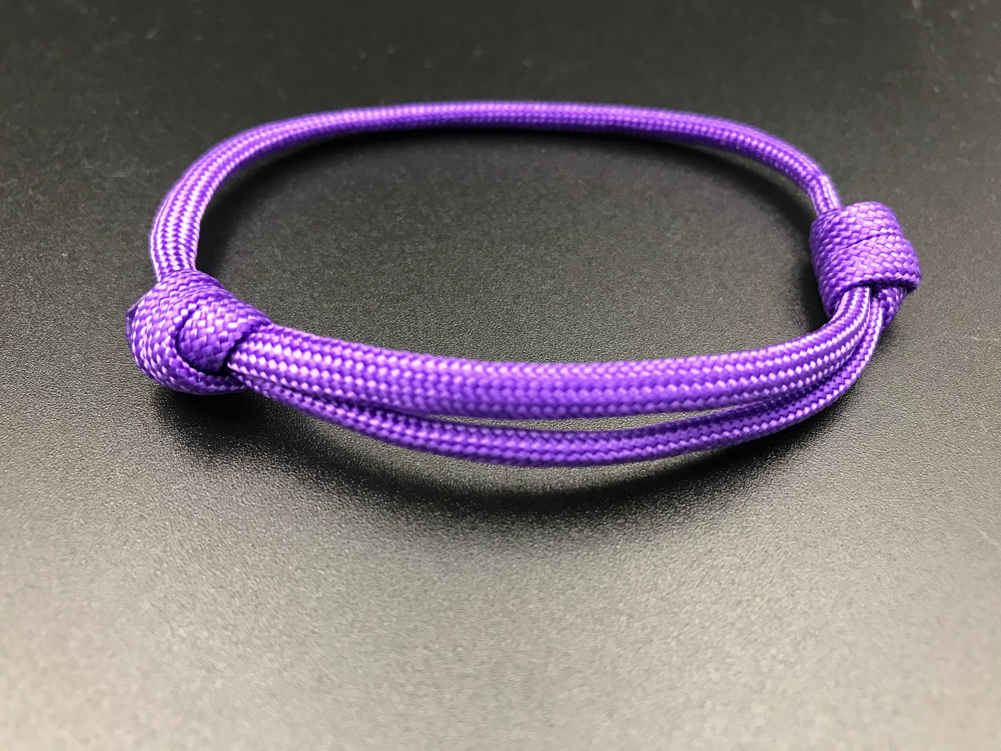 Paracord friendship bracelet In purple light weight and adjustable