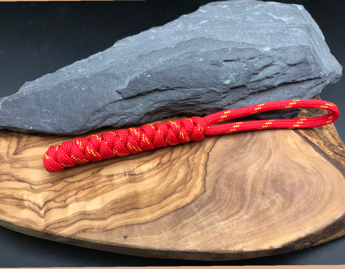Hand made Paracord EDC multi tool - torch and keys lanyard 
Made from our Pheonix Red (Red with yellow) coloured Paracord in a snake knot design weave