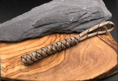 Paracord EDC multi tool - torch and keys lanyard 
Hand made in a desert camo coloured Paracord and woven in a snake knot design in the U.K. 