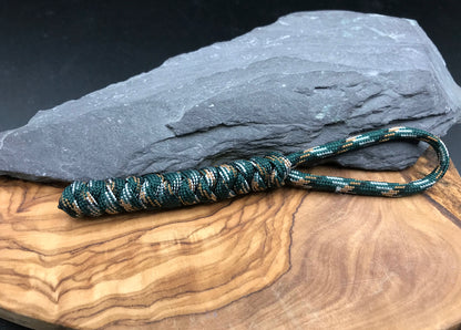 Hand made Paracord EDC multi tool - torch and keys lanyard 
Made from Urban camo (greens blacks and brown) coloured Paracord in a snake knot design