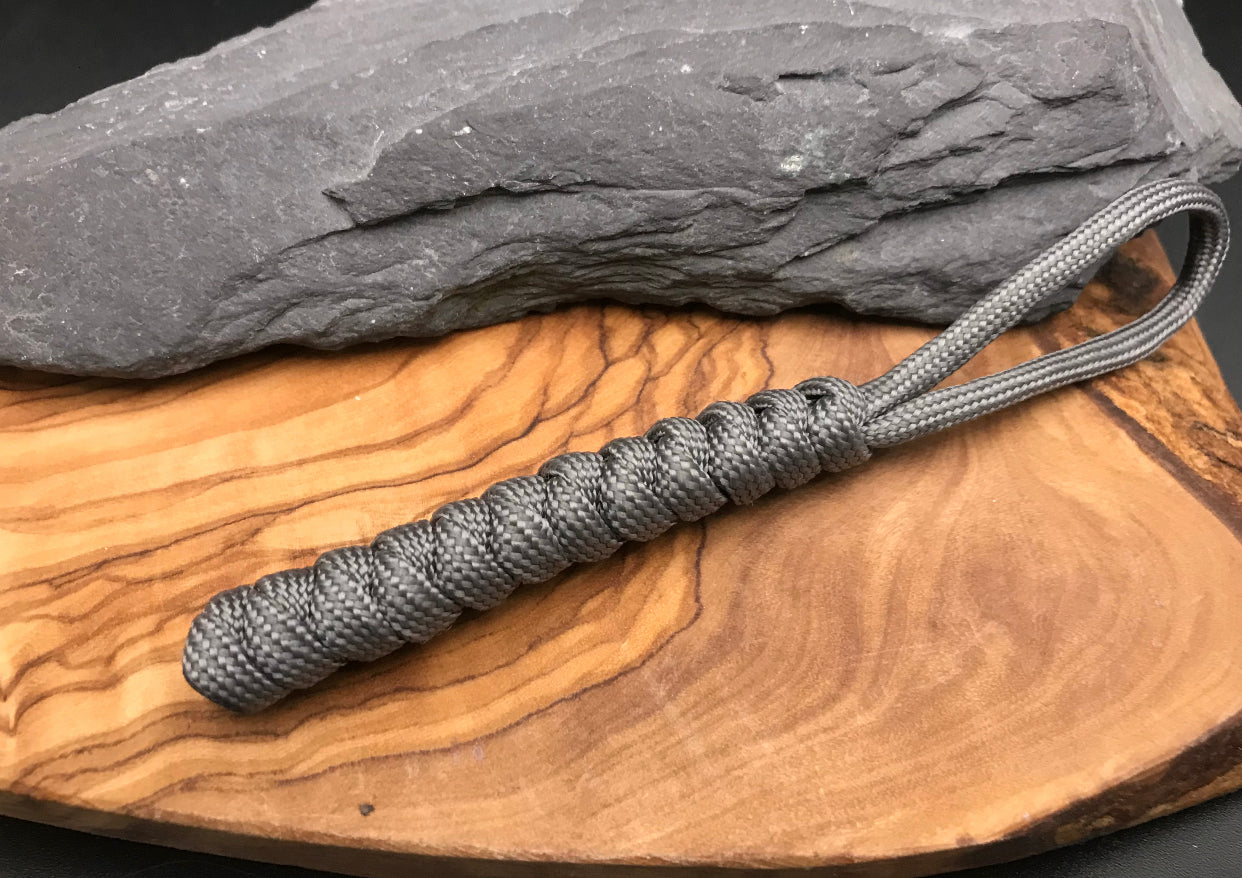 Paracord EDC multi tool - torch and keys lanyard 
Hand Made in a Anthracite grey coloured Paracord with the snake knot design