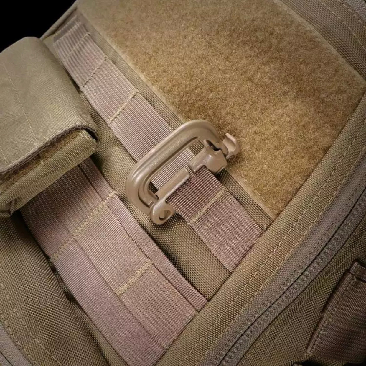 Tactical bag molle D ring attachment