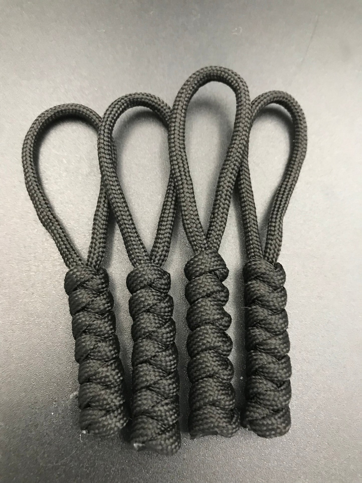 Paracord zip pulls in black (4 pack) hand made in U.K. 