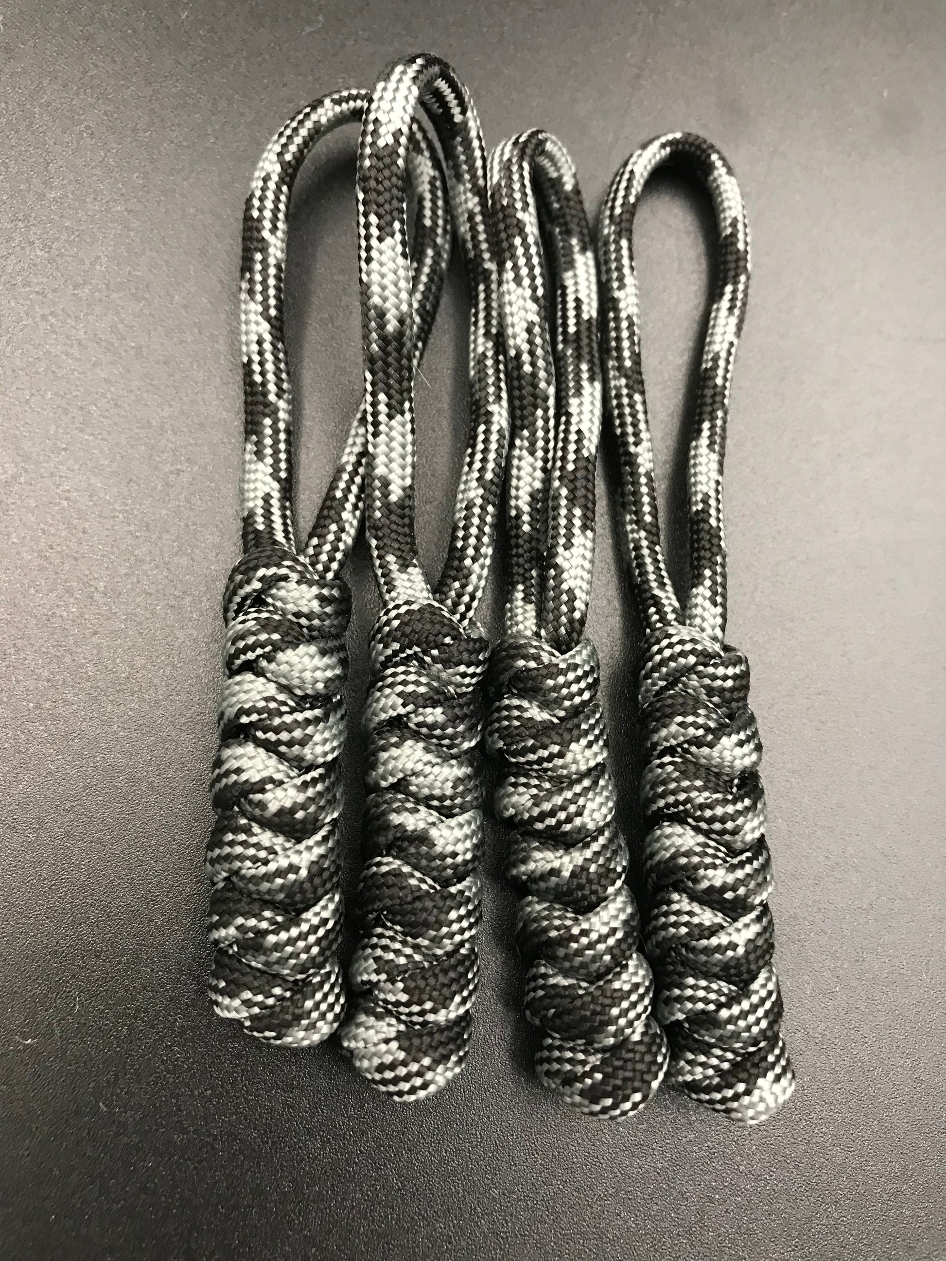 Paracord zip pulls in graphite grey (grey and black mix) ( 4 pack) light weight and strong, handmade in U.K. 