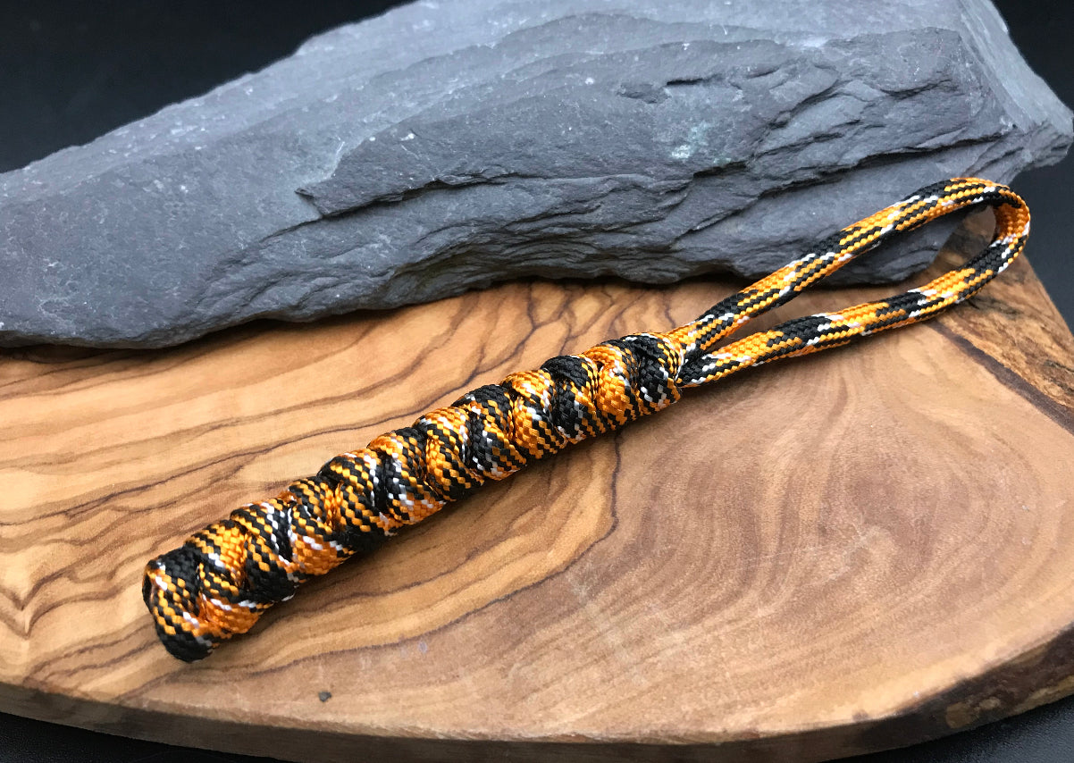 Hand made Paracord lanyard in Orange camo ( orange black white colour snake knot design