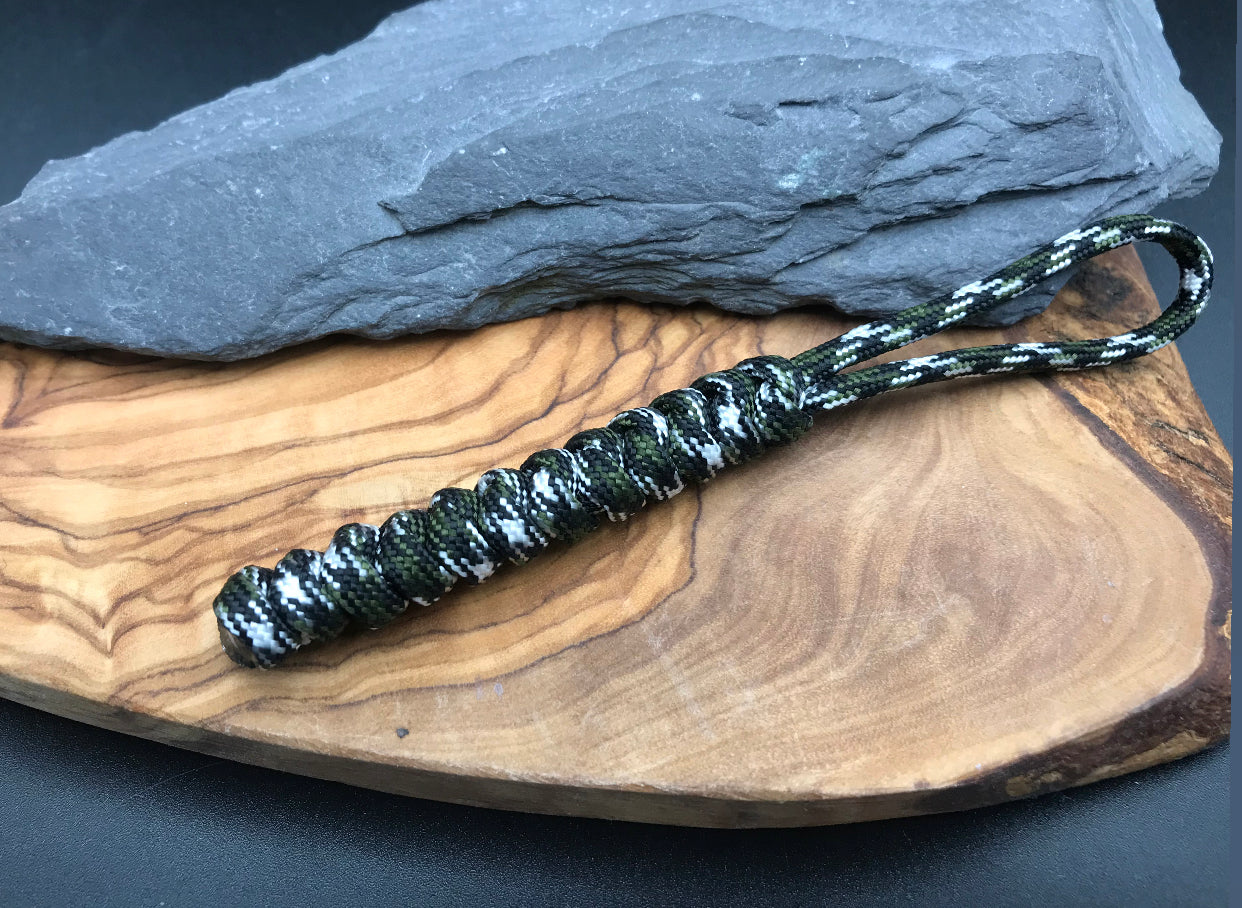 Paracord EDC multi tool - torch and keys lanyard 
Hand Made in a cobra camo (green black white and grey coloured Paracord in the snake knot design